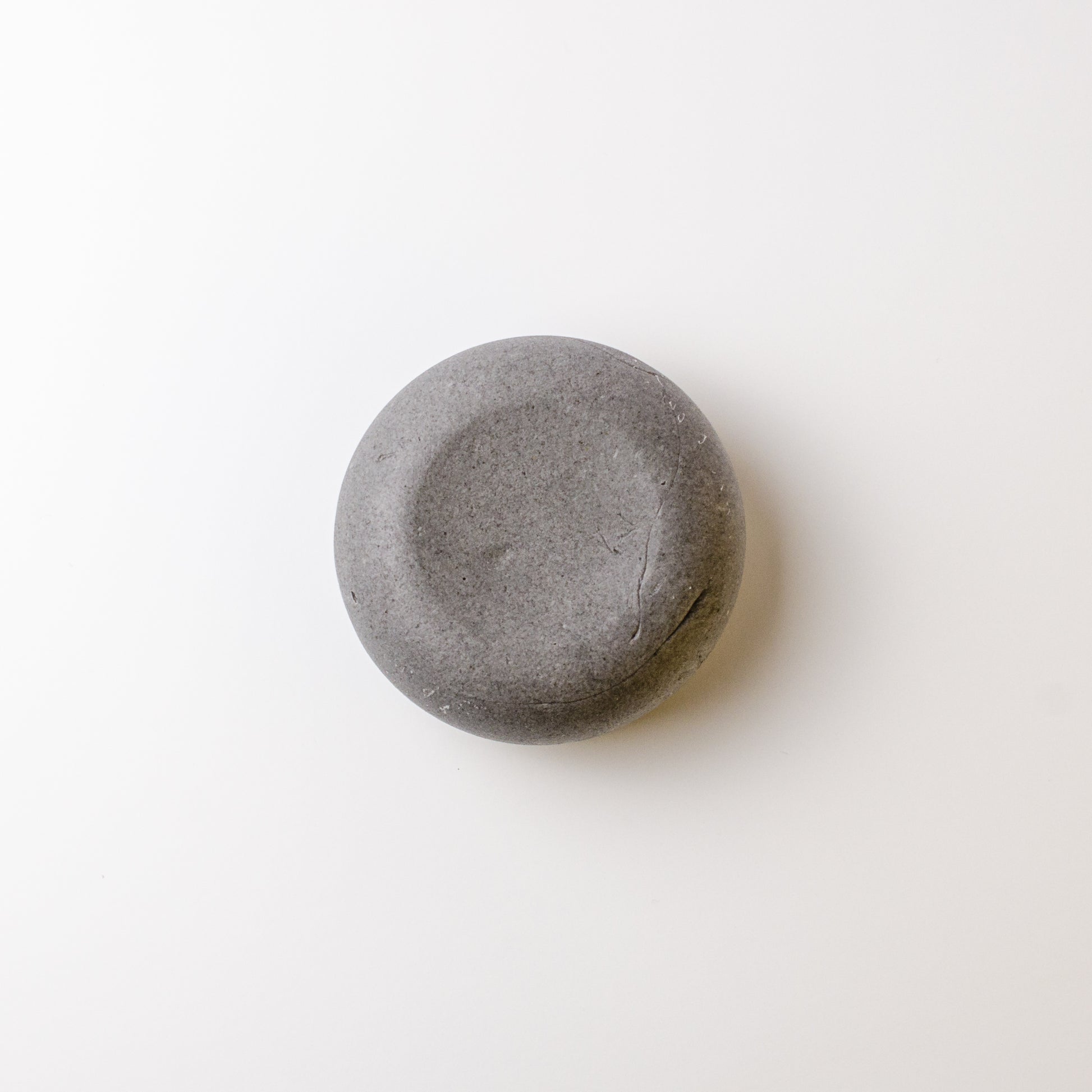 activated charcoal, burdock root and bentonite clay with tea tree shampoo bar