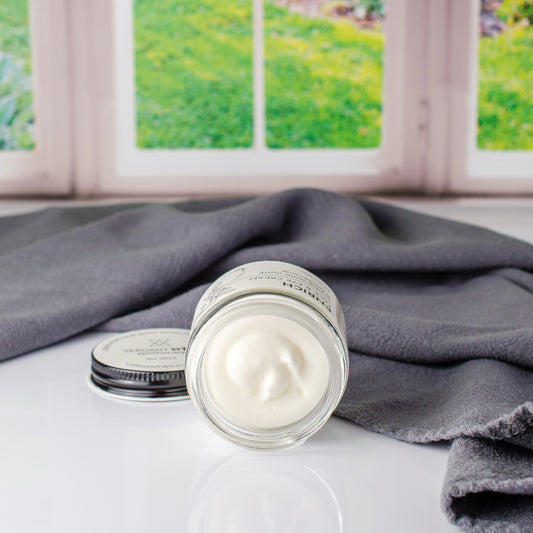 Face and eye cream with frankincense, myrrh and pomegranate seed oil 2 oz open