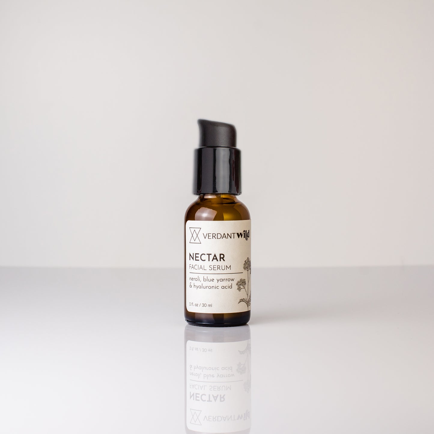 Bottle of Verdant Nectar Facial Serum on a white background