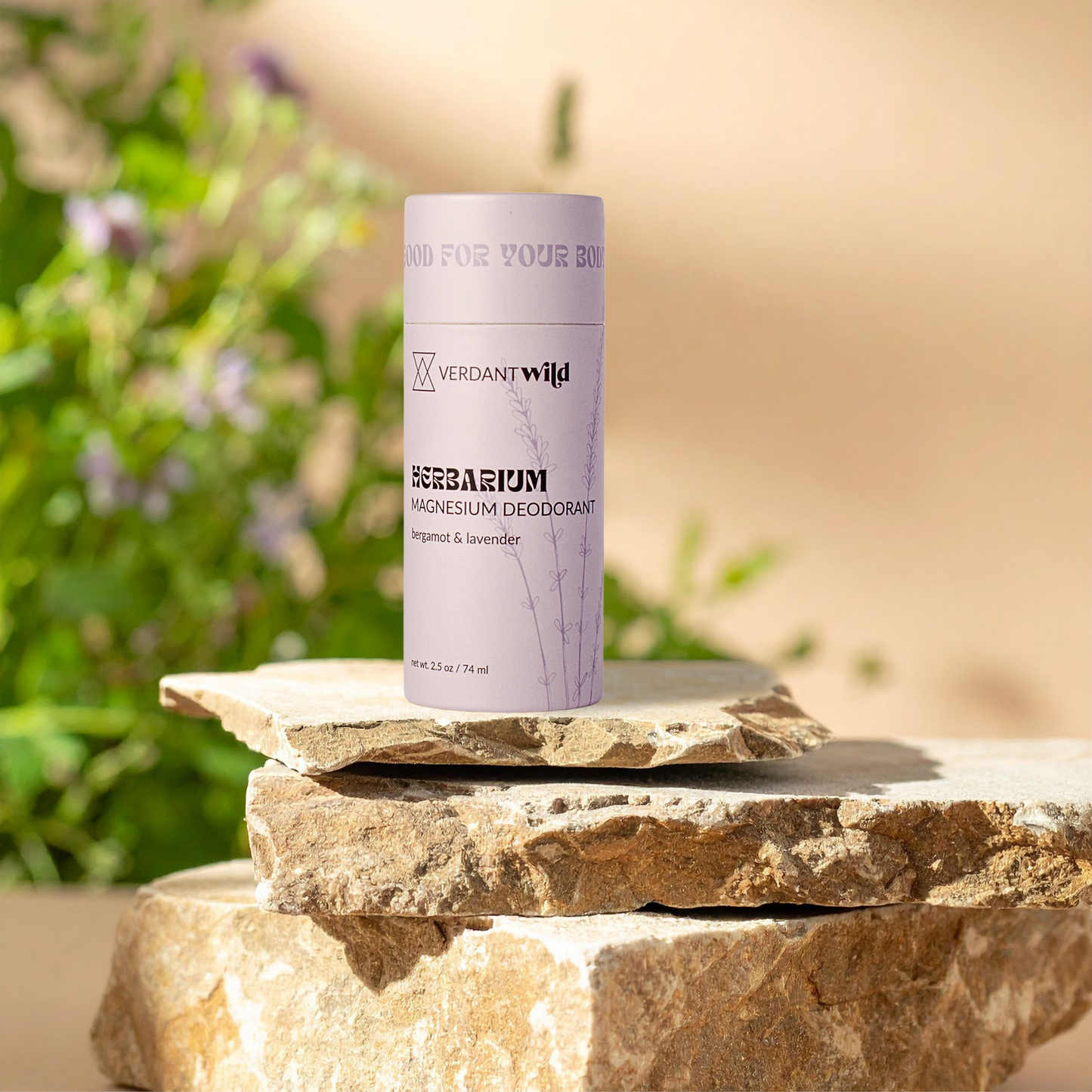 Herbarium magnesium deodorant container on a stone surface with a natural background