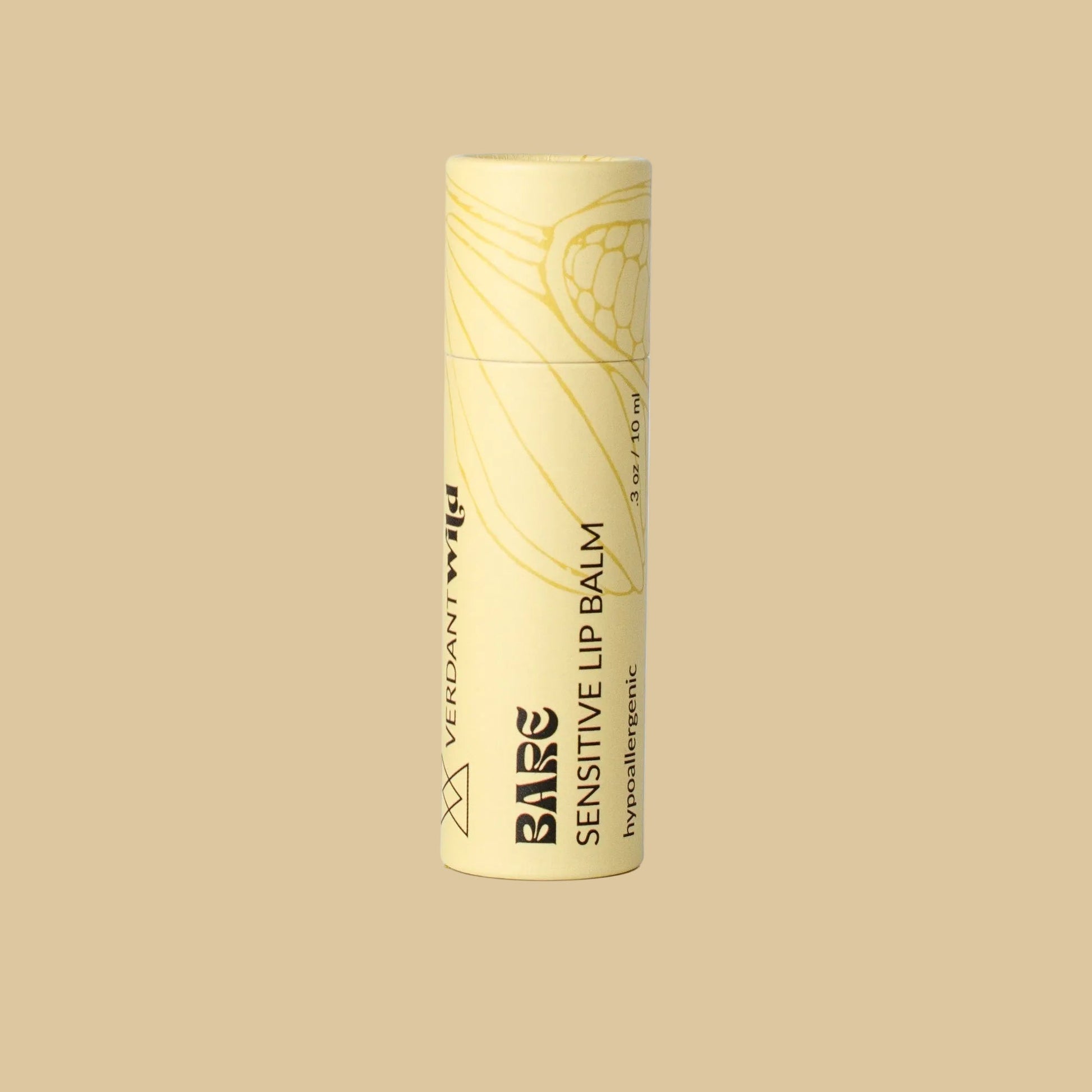 A single tube of Bare Sensitive Lip Balm in a pale yellow packaging with black text and line art, standing upright