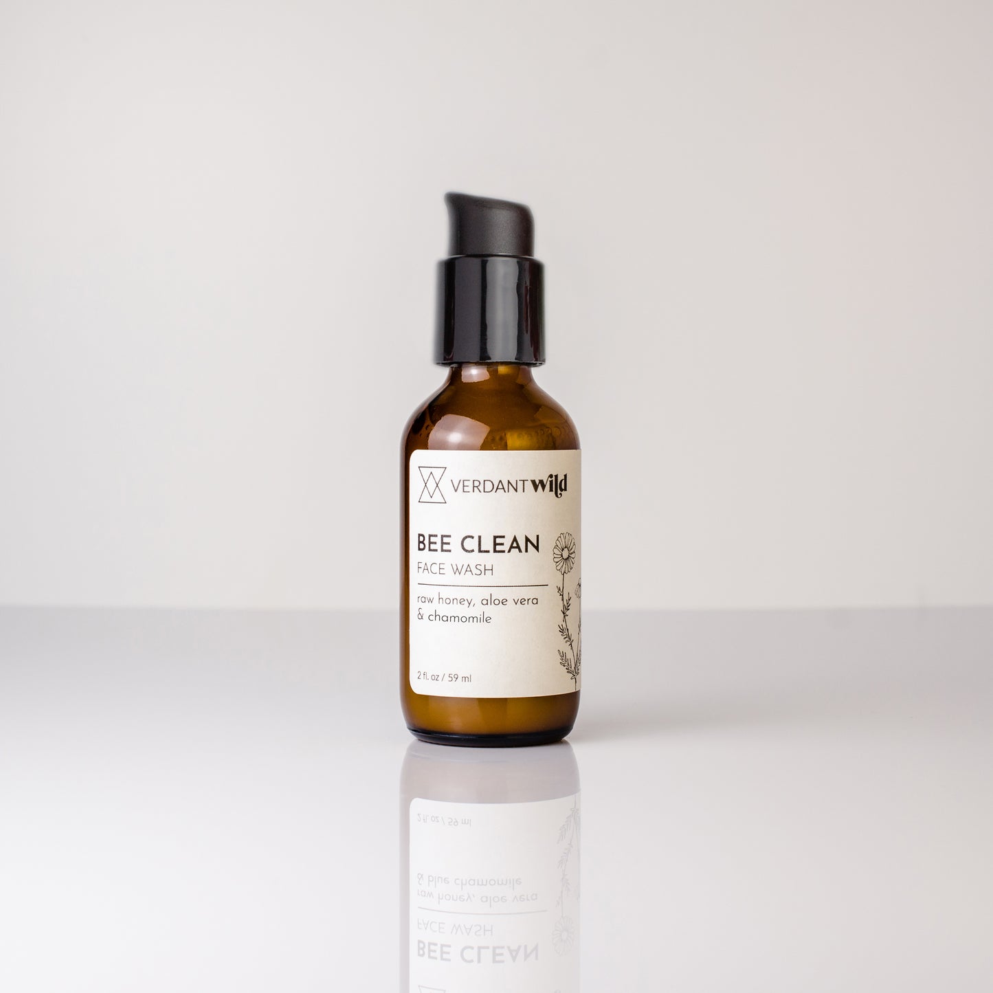 Bottle of Verdant Wild Bee Clean Face Wash on a white background