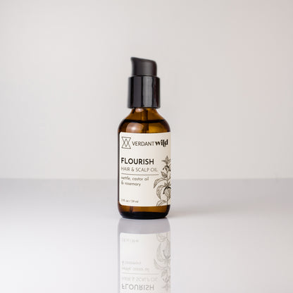 Bottle of Verdant Wild Flourish Hair & Scalp Oil on a white background