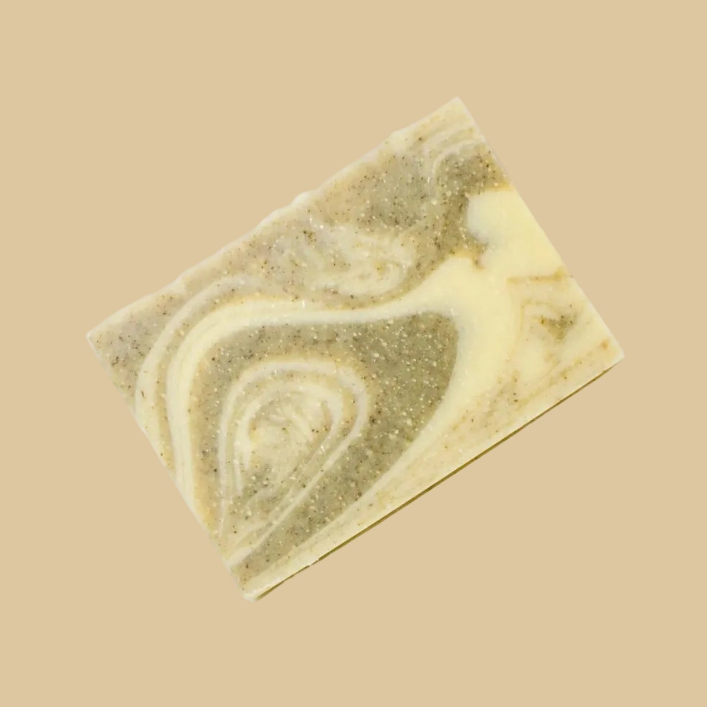 A rectangular bar of handmade soap with a marbled swirl pattern of olive green and cream, photographed on a clean background.