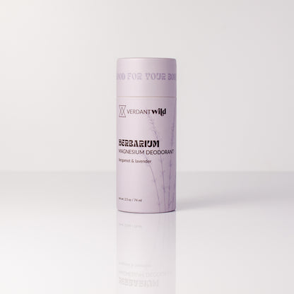 Deodorant container with 'Verdant Wild' branding on a white background