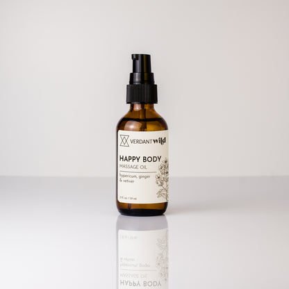 Bottle of Verdant Wild Happy Body Massage Oil on a white background