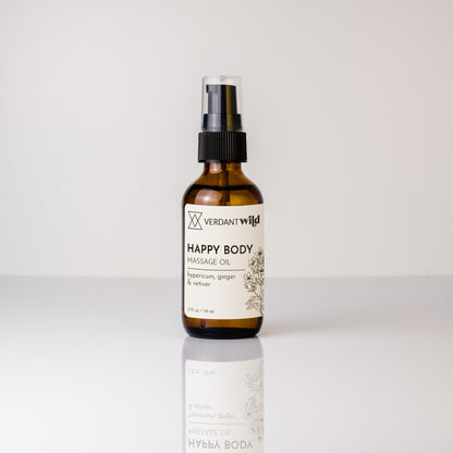 Bottle of Verdant Wild Happy Body Massage Oil on a white background