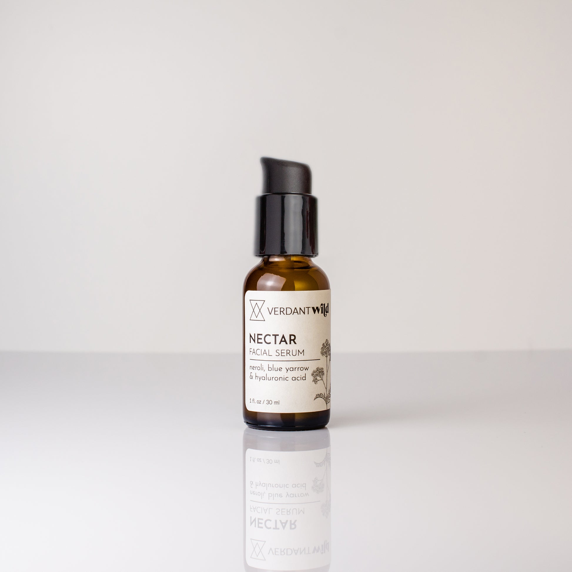 Bottle of Verdant Nectar Facial Serum on a white background