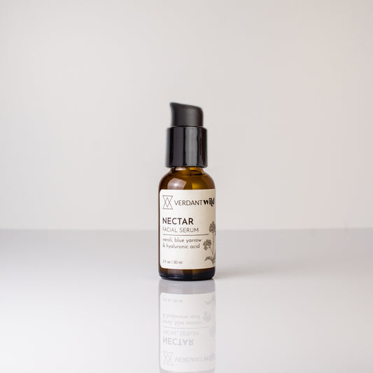 Bottle of Verdant Nectar Facial Serum on a white background