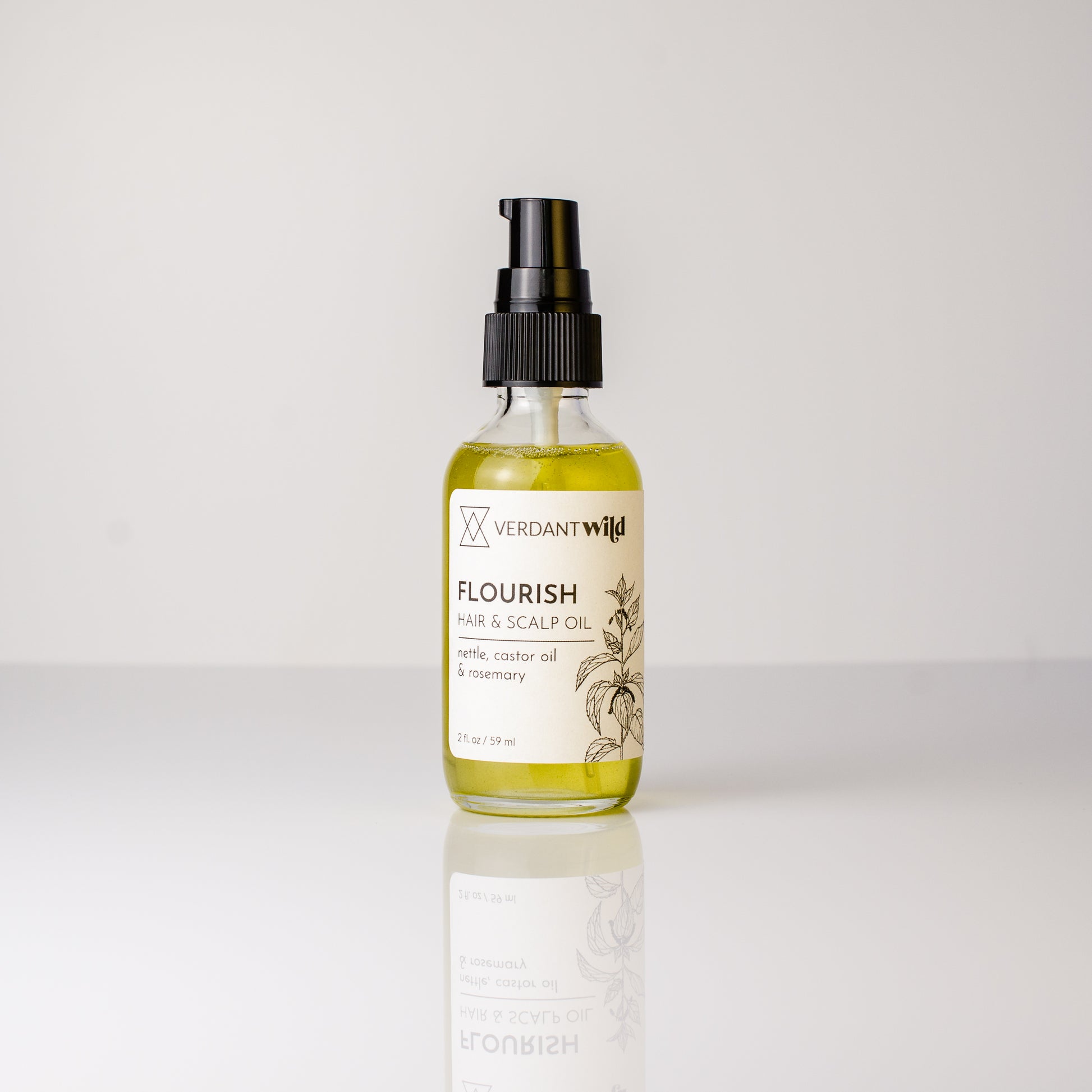 wildcrafted nettle, castor oil and rosemary hair and scalp oil open