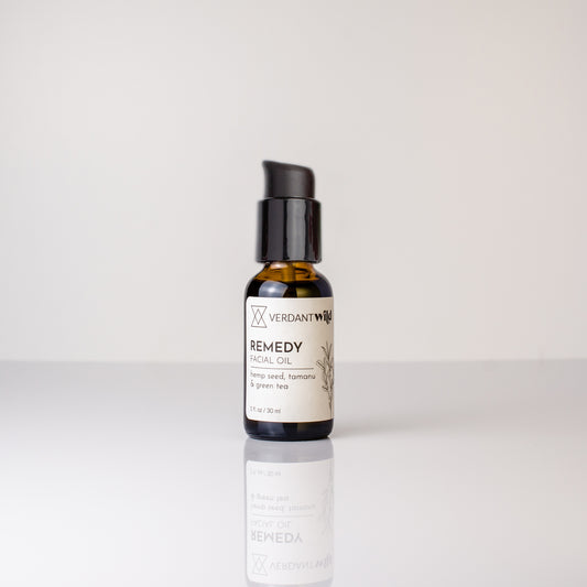 Bottle of Verdant Wild Remedy Facial Oil on a white background