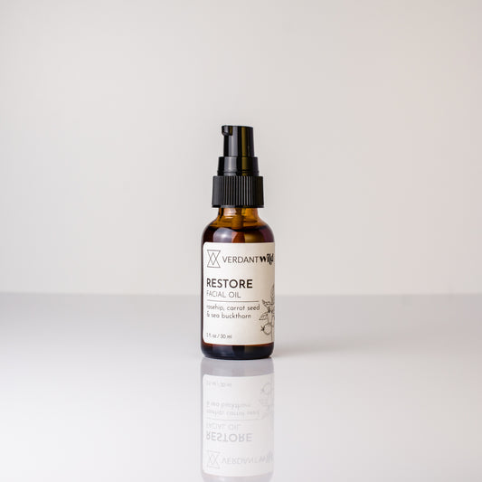 restoring facial oil with rose hip, sea buckthorn and carrot seed open