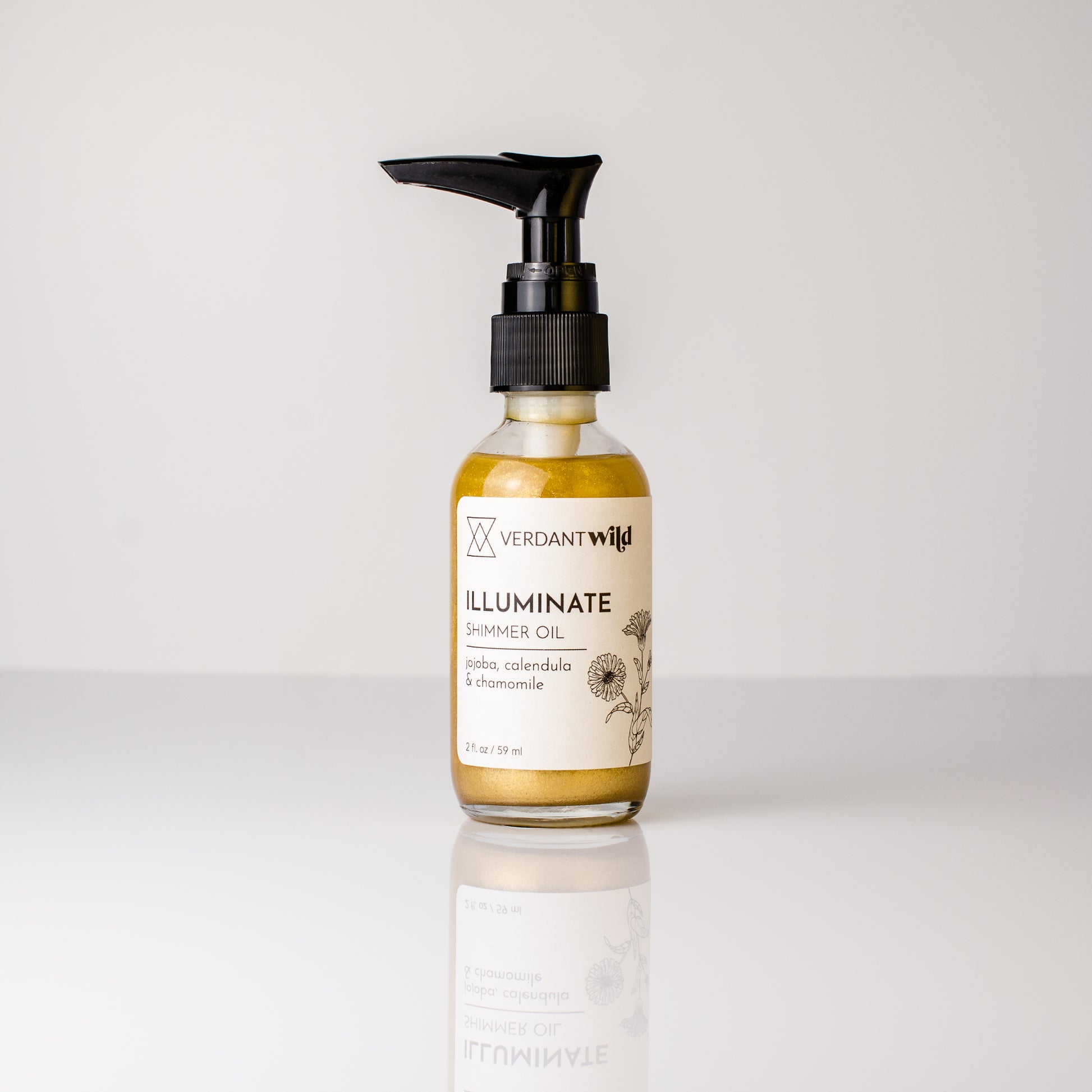 Moisturizing face & body oil with biodegradable gold shimmer