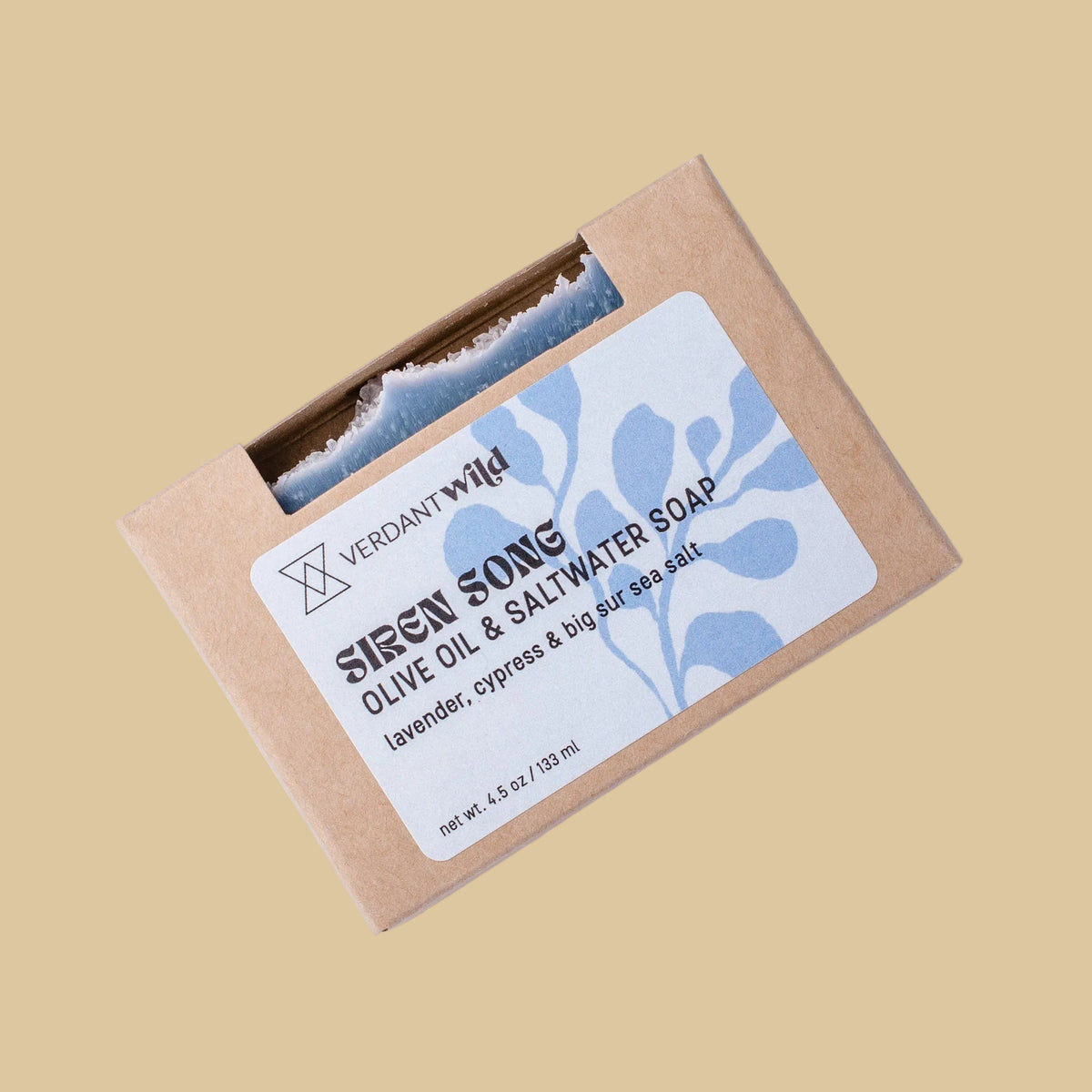 A kraft paper box of Verdant Wild Siren Song Olive Oil & Saltwater Soap, featuring a light ble label with blue botanical illustrations.