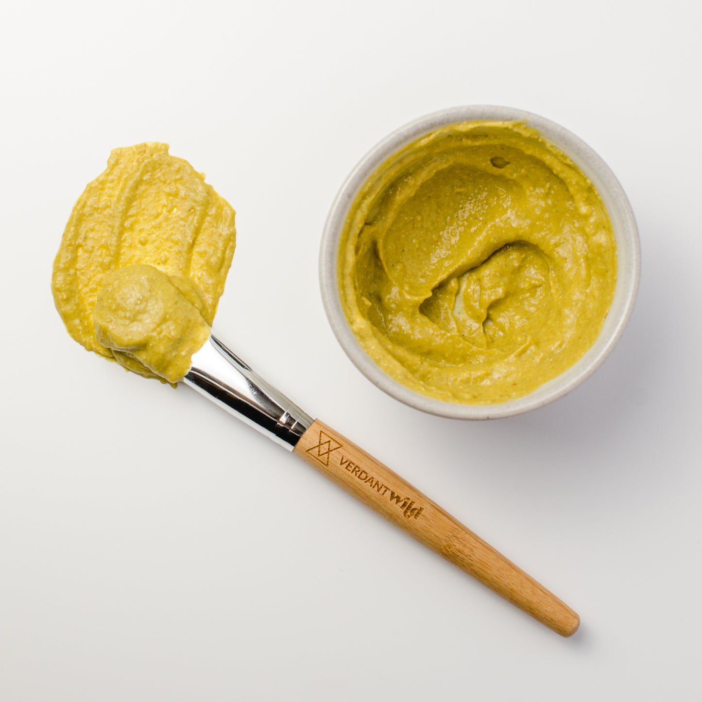 turmeric, neem leaf and chamomile facial grains exfoliating mud mask mixed texture