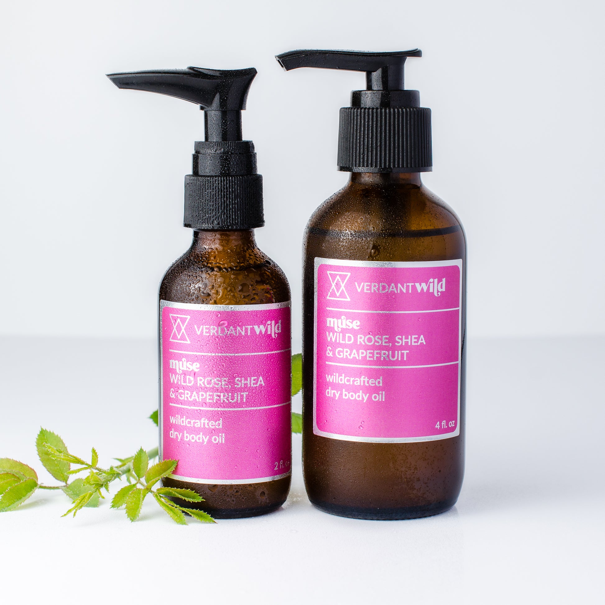 wild rose dry body oil with shea and rose leaf prop, misted with water cooling effect